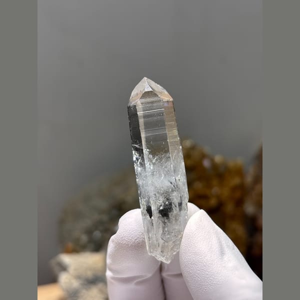 Slender water-clear double-terminated quartz from Jinkouhe, Sichuan — detail view