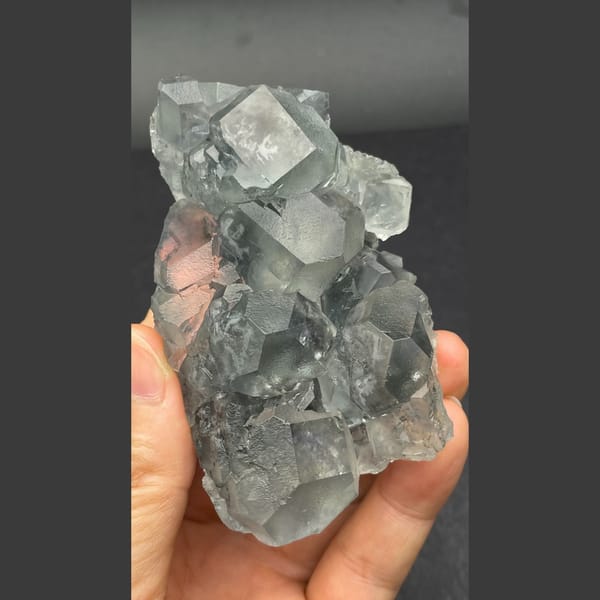 Glassy pale blue fluorite cluster from Fujian — complete view