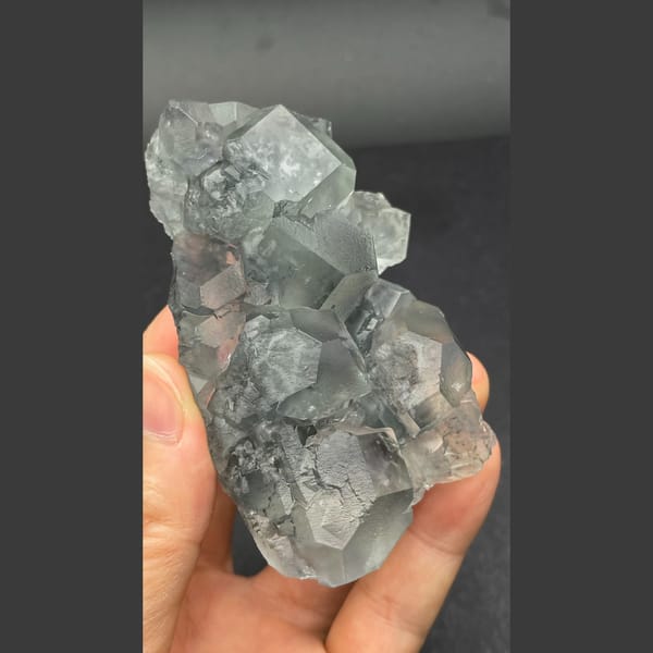 Glassy pale blue fluorite cluster from Fujian — alternate view