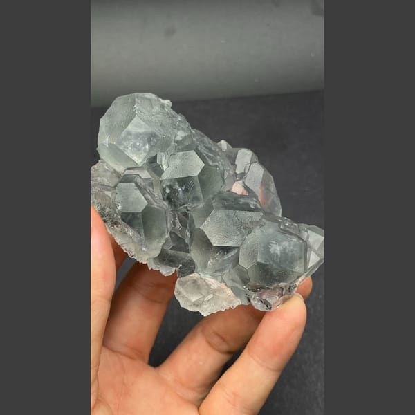 Glassy pale blue fluorite cluster from Fujian — alternate view