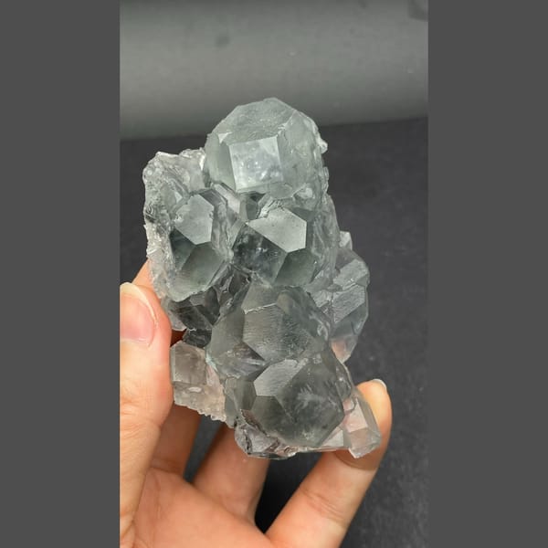 Glassy pale blue fluorite cluster from Fujian — detail view