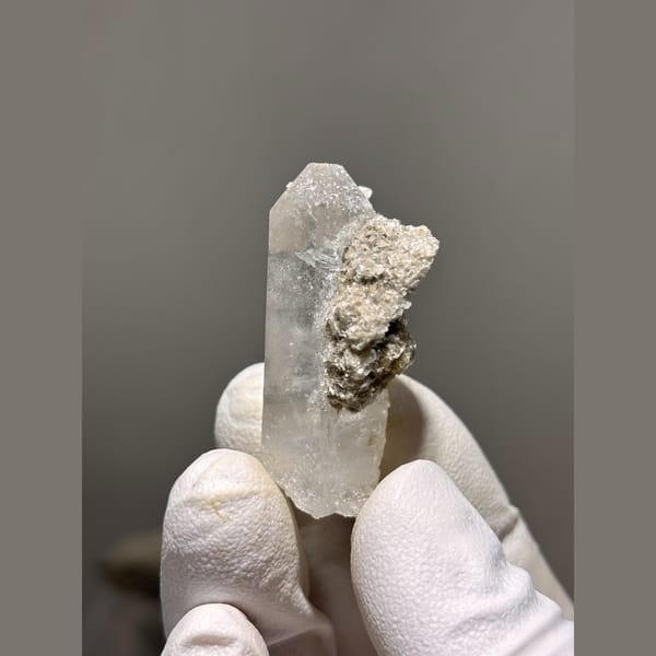 Clear quartz floater with mica from Xuebaoding, Sichuan — alternate view