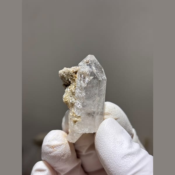 Clear quartz floater with mica from Xuebaoding, Sichuan — alternate view