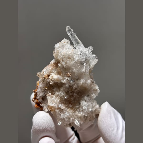 Clear quartz points with cream gypsum from Jinkouhe, Sichuan — alternate view