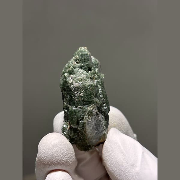 Castle-form quartz with green chlorite phantoms from Tibet — complete view