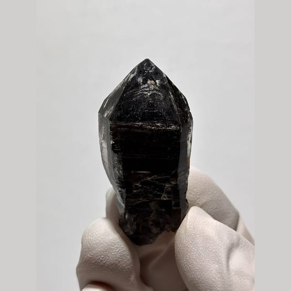 Glossy near-black double-terminated quartz from Yunnan — alternate view