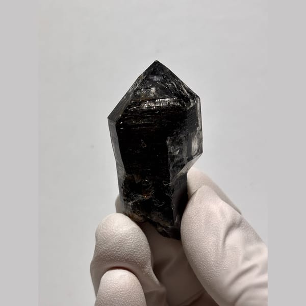Glossy near-black double-terminated quartz from Yunnan — alternate view
