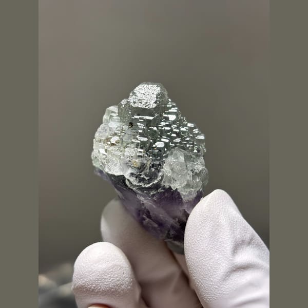 Stepped pale green fluorite with purple base from Fujian — alternate view