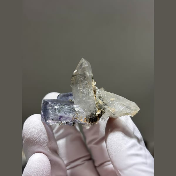 Clear quartz point on blue-grey fluorite from Yaogangxian, Hunan — alternate view