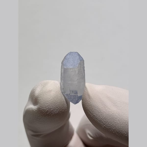 Tiny blue double-terminated dumortierite quartz from Brazil — alternate view