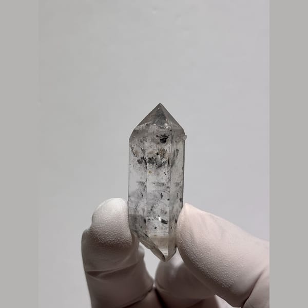 Clear double-terminated quartz with small inclusions from Jinkouhe — alternate view