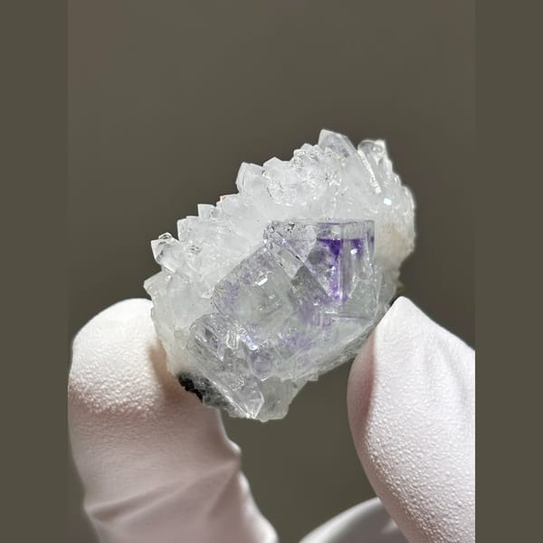 Purple fluorite nestled in sparkling white quartz from Zhejiang — alternate view