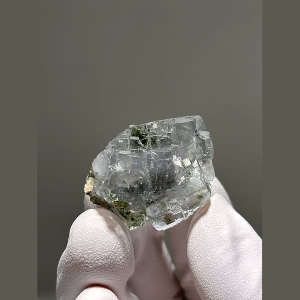 Stepped glassy pale blue fluorite from Yaogangxian — detail view