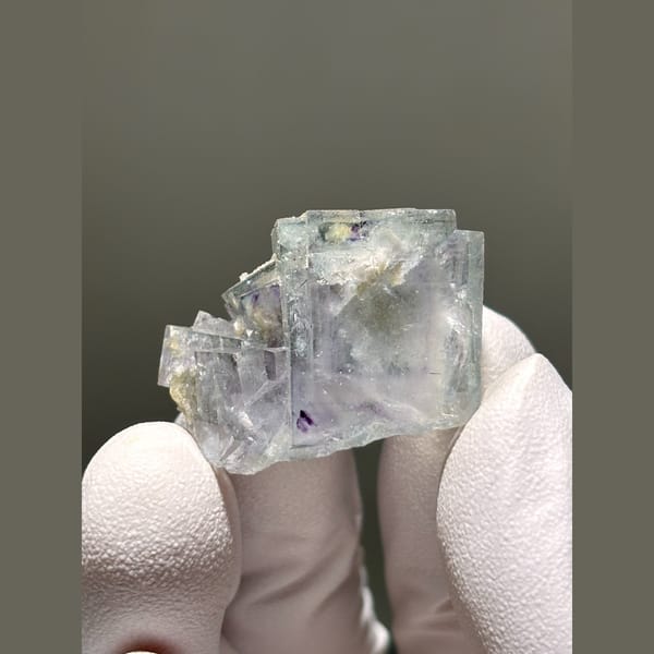 Glassy pale lavender fluorite cube from Yaogangxian — complete view