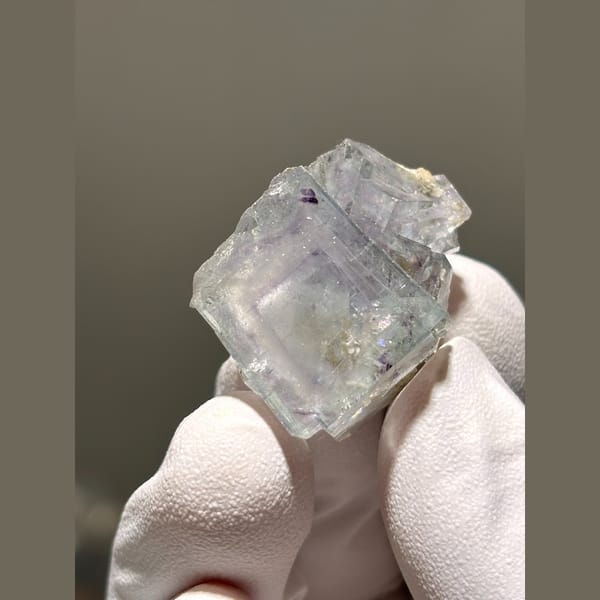 Glassy pale lavender fluorite cube from Yaogangxian — alternate view