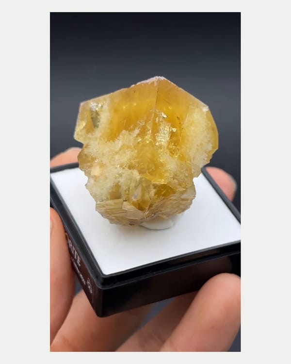 Complete side oblique view of golden-yellow Tanghekou fluorite