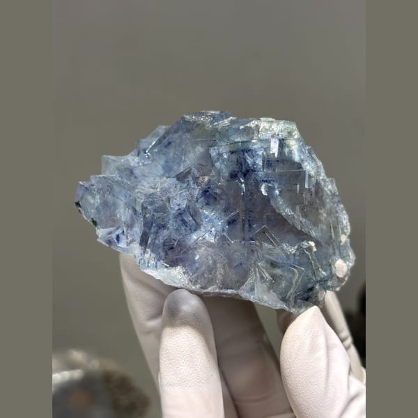 Large glassy blue fluorite cluster from Yaogangxian — detail view