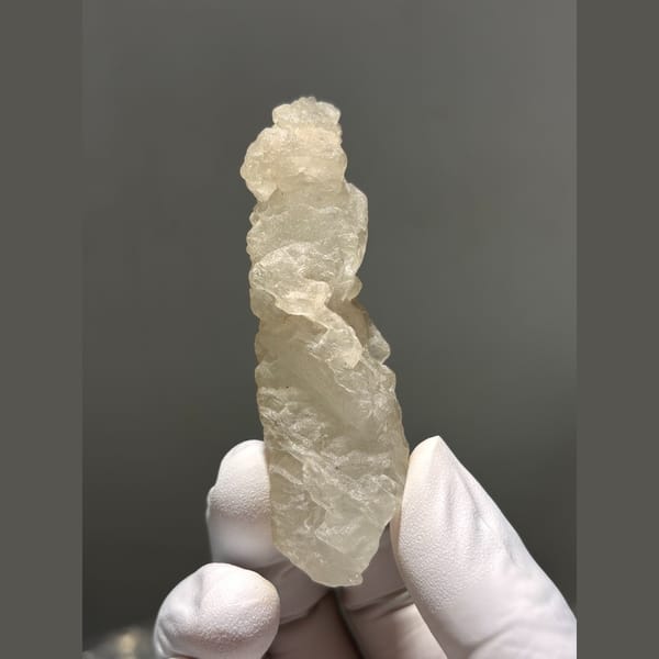 Deeply etched icy quartz crystal from Madagascar — alternate view