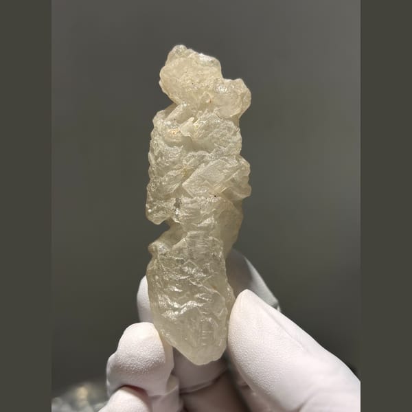 Deeply etched icy quartz crystal from Madagascar — alternate view
