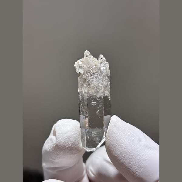 Water-clear quartz point from Xuebaoding, Sichuan — detail view