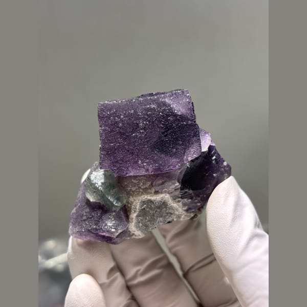 Interlocking dark purple fluorite cubes from Inner Mongolia — detail view