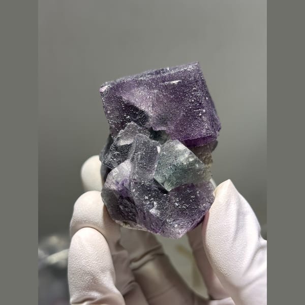 Interlocking dark purple fluorite cubes from Inner Mongolia — detail view