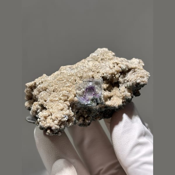 Purple fluorite with mica and quartz in matrix from Yaogangxian — detail view