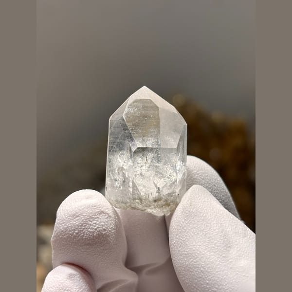 Small clear quartz floater point from Xuebaoding — alternate view