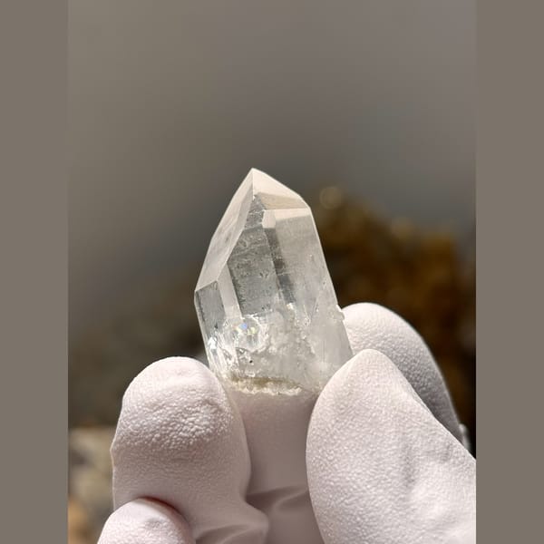 Small clear quartz floater point from Xuebaoding — alternate view