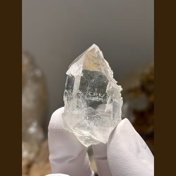 Clear etched quartz floater from Xuebaoding — complete view