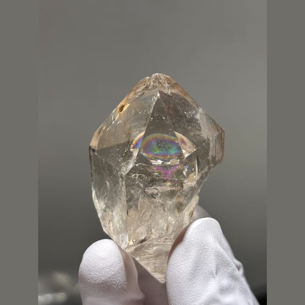 Champagne quartz crystal with internal rainbows from Yunnan — alternate view