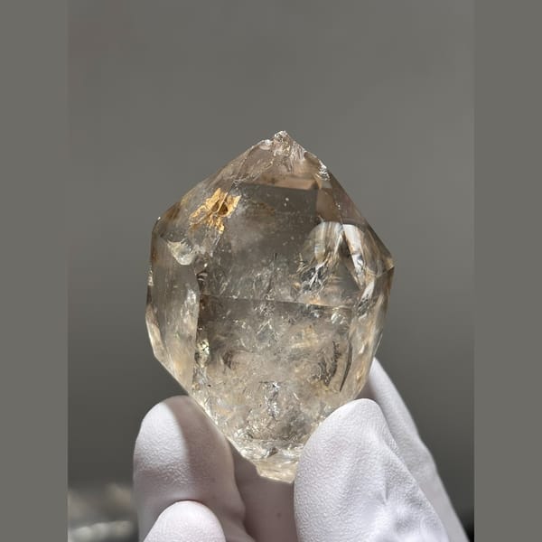 Champagne quartz crystal with internal rainbows from Yunnan — alternate view