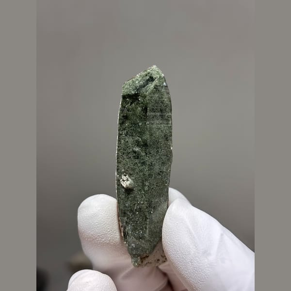 Slender green chlorite quartz floater from Tibet — complete view