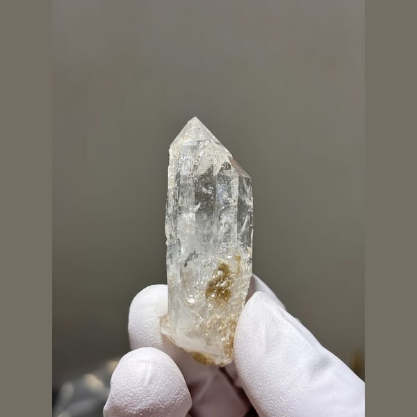 Slender clear quartz point from Xuebaoding — alternate view