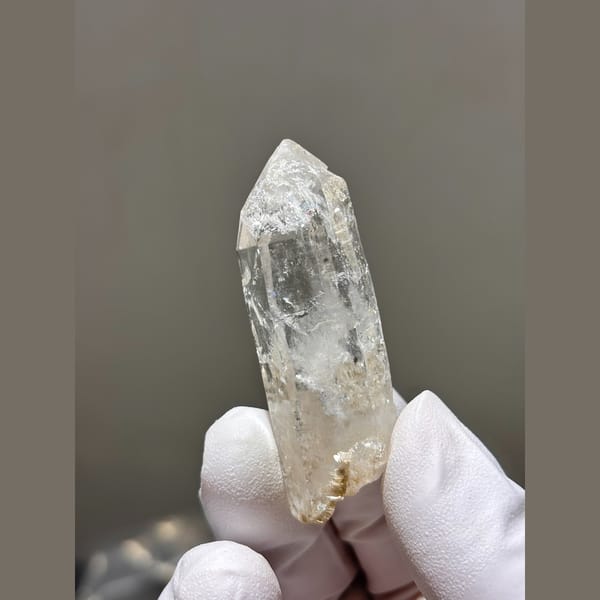 Slender clear quartz point from Xuebaoding — alternate view