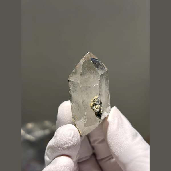 Light smoky quartz point from Xuebaoding — alternate view