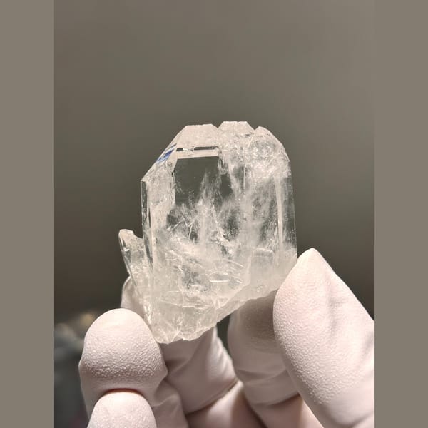 Flat clear quartz crystal from Xuebaoding — alternate view