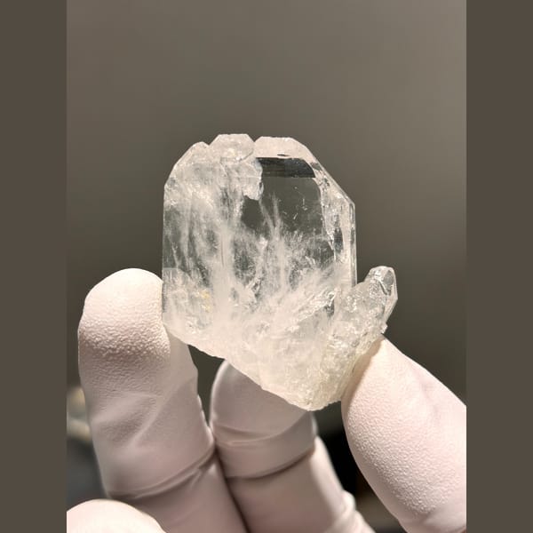 Flat clear quartz crystal from Xuebaoding — alternate view