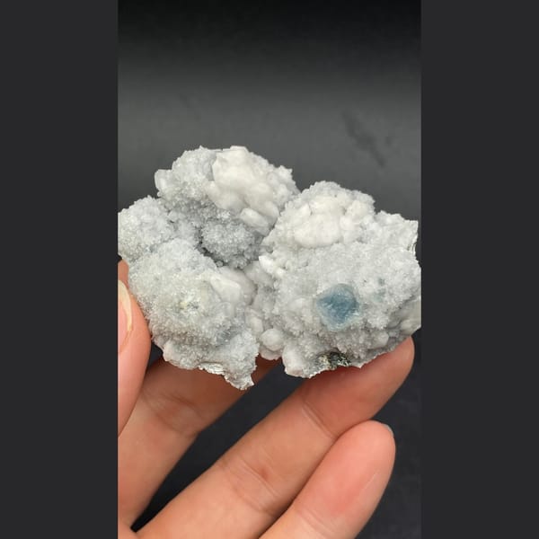 White candle quartz with small blue fluorite from Inner Mongolia — detail view