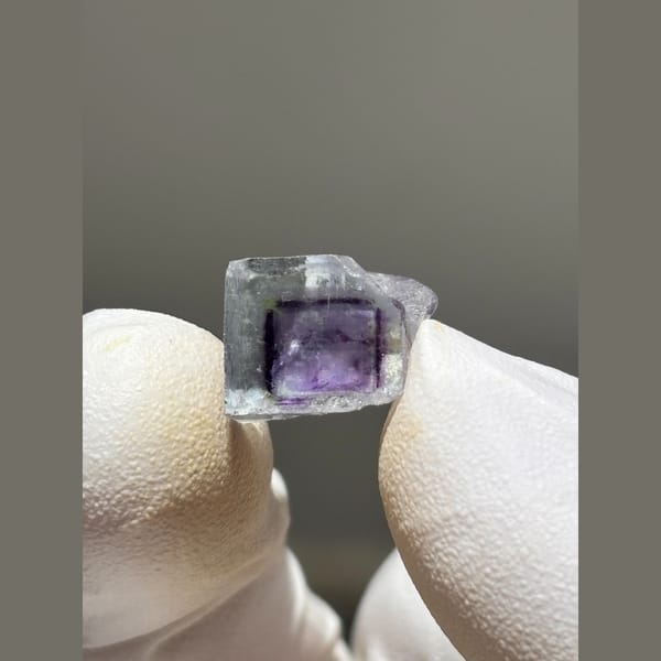 Small zoned fluorite cube with purple core from Yaogangxian — alternate view