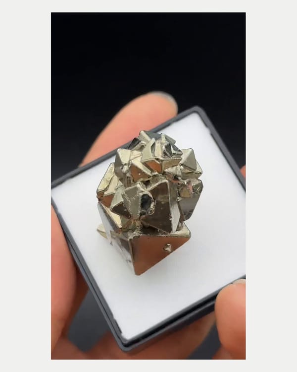 Complete top view of interlocking octahedral pyrite crystals