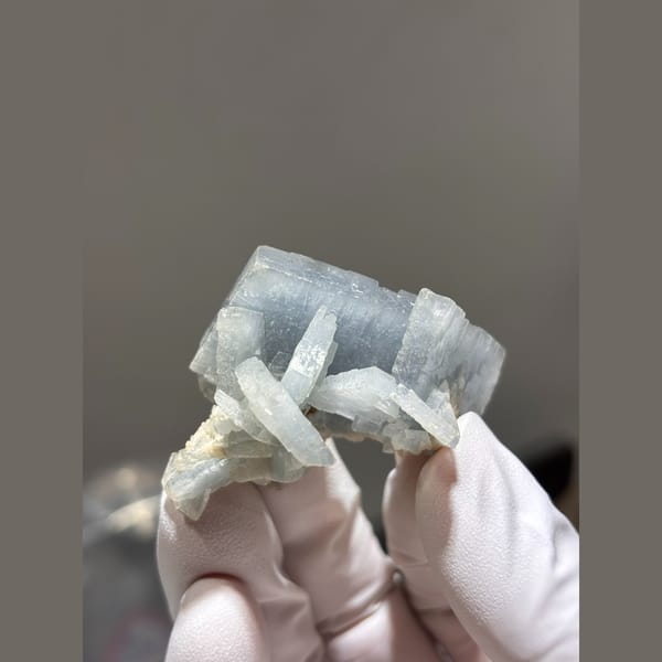 Natural pale blue bladed barite crystal cluster — alternate view