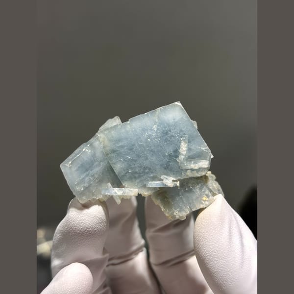 Natural pale blue bladed barite crystal cluster — alternate view