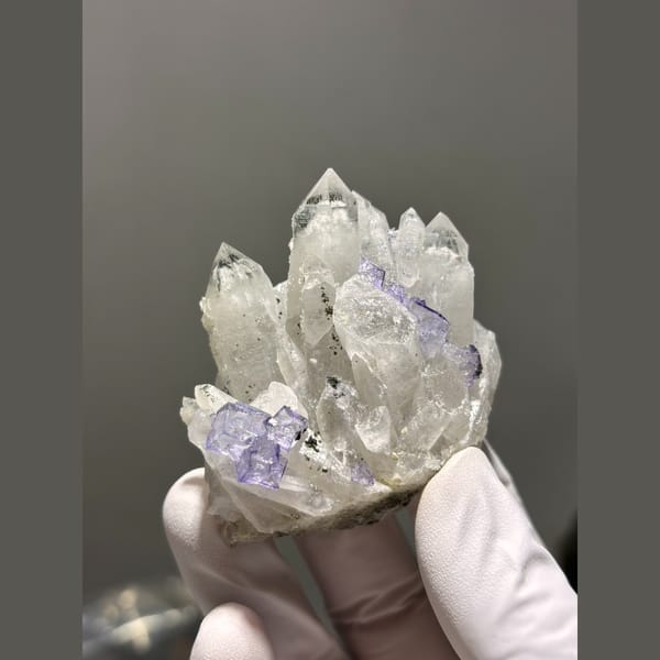 Quartz cluster with small purple fluorite from Yaogangxian — complete view