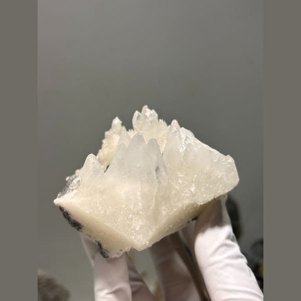 Creamy dogtooth calcite floater cluster from Hubei — detail view