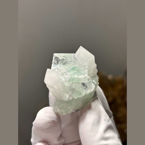 Glassy green fluorite with white quartz from Zhejiang — complete view