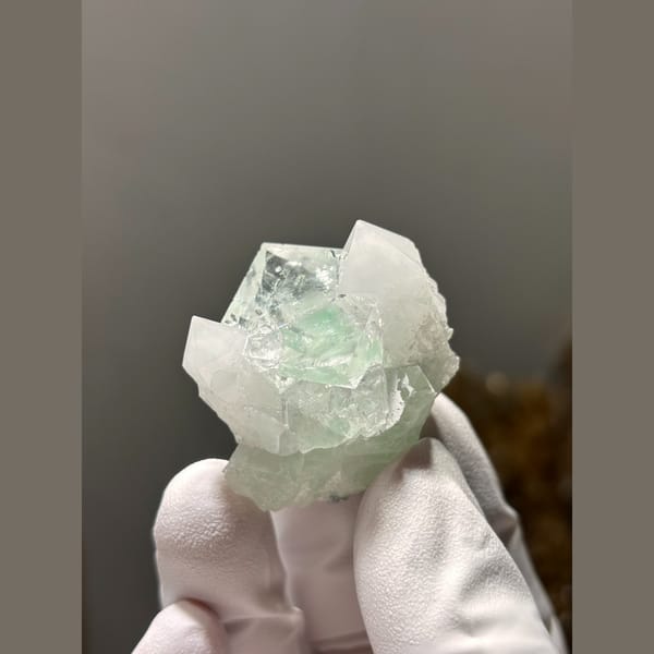 Glassy green fluorite with white quartz from Zhejiang — alternate view
