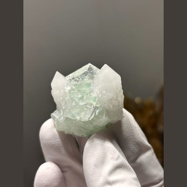Glassy green fluorite with white quartz from Zhejiang — alternate view