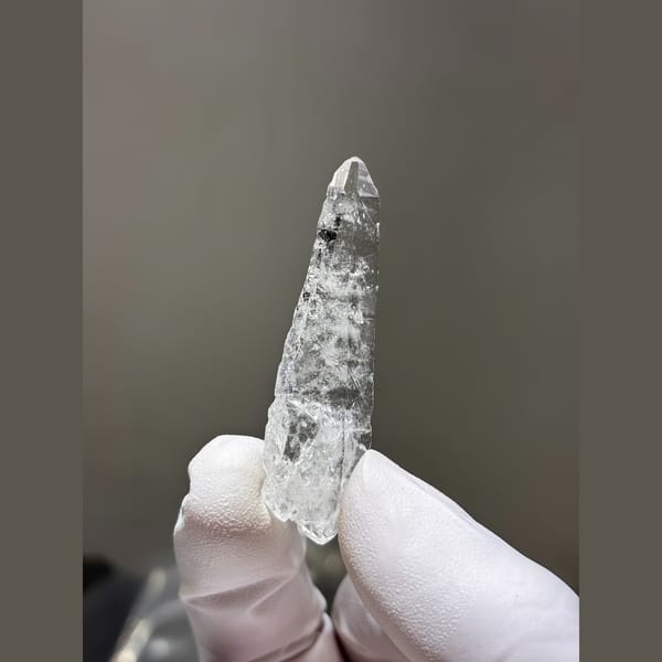 Slender double terminated clear quartz from Xuebaoding — alternate view