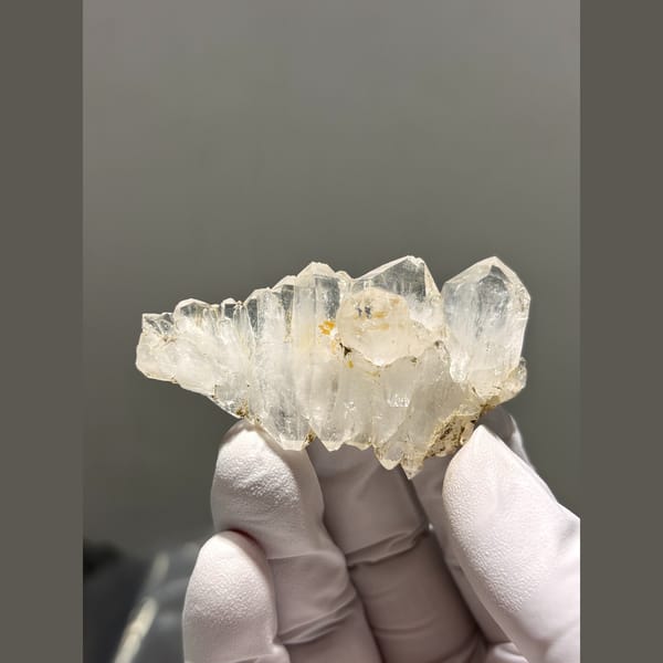 Fan of stitched clear quartz crystals from Tibet — complete view